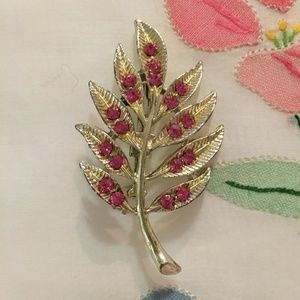 Vintage silver-tone leaf pin with pink rhinestones